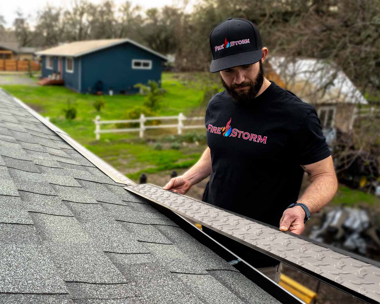 handyman installing firestorm gutter guards