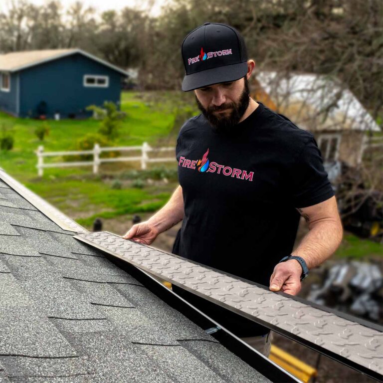 handyman installing firestorm gutter guards